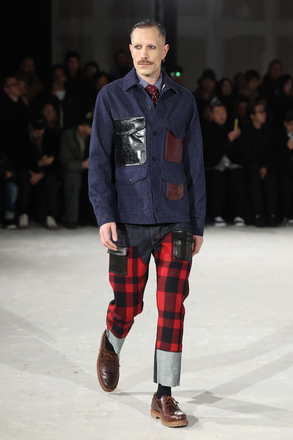 Junya Watanabe's menswear Fall-Winter 2025 show featured tartan prints.